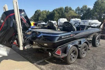 Slide: The Image of 2025 Ranger Z520R boat with dual motors and trailer in outdoor setting. - 3