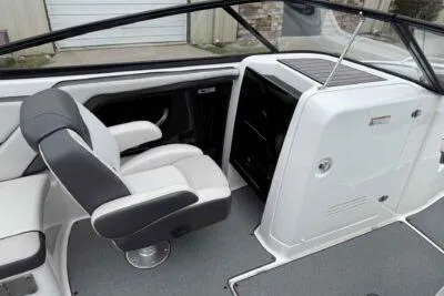 Slide: The Image of 2018 Yamaha Boats AR240 interior with sleek seating and modern dashboard design. - 10