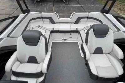 Slide: The Image of 2018 Yamaha Boats AR240 interior with dual seating and sleek design. - 12