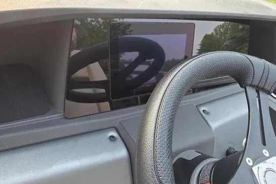 Slide: The Image of Steering wheel and dashboard of 2026 Sun Tracker Party Barge 20 DLX pontoon boat. - 12