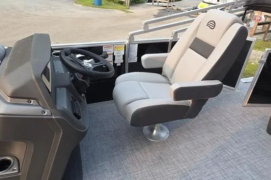 Slide: The Image of Captain's chair and helm of 2026 Sun Tracker Party Barge 20 DLX pontoon boat. - 14