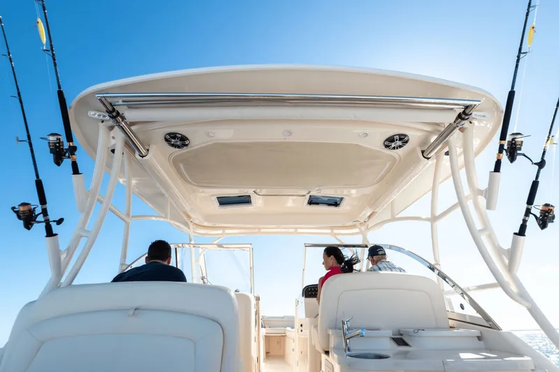 Slide: The Image of Interior view of 2026 Grady-White Freedom 325 boat at the marina. - 7