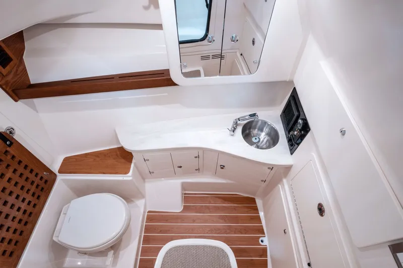 Slide: The Image of Interior of Grady-White Freedom 325 boat, model year 2026. - 8