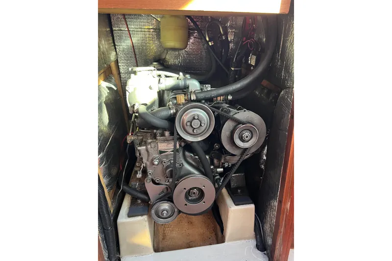 Slide: The Image of Engine compartment of a 1990 Hunter Legend 35.5 sailboat. - 31