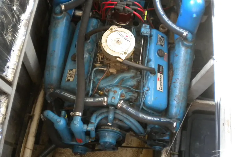 Slide: The Image of Engine compartment of a 1988 Mainship 40 Double Cabin with Crusader engine. - 25