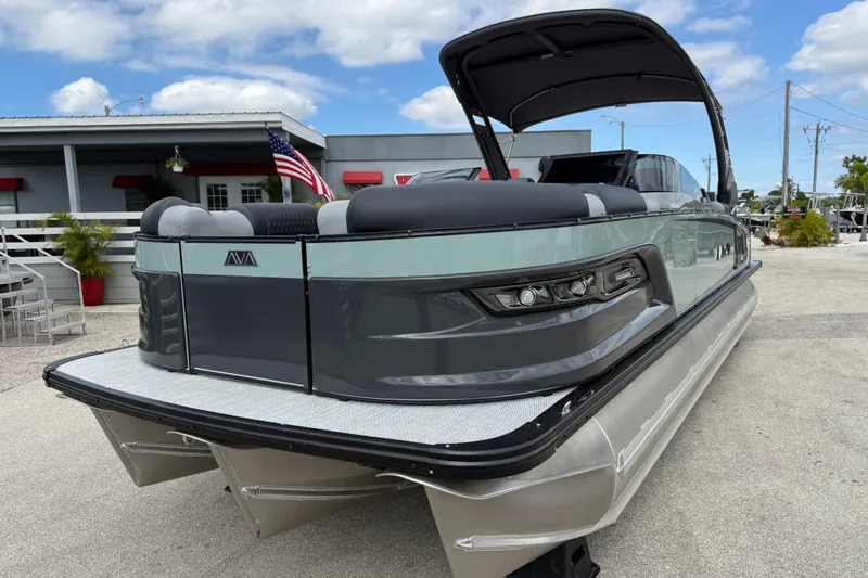 Slide: The Image of 2026 Avalon 2585 Excalibur LTD Tri Toon boat with Mercury 400hp V-10 Verado engine. - 2