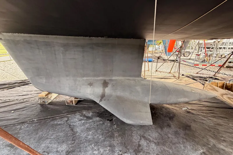 Slide: The Image of Keel of a 2016 Jeanneau 64 yacht on dry dock for maintenance. - 52