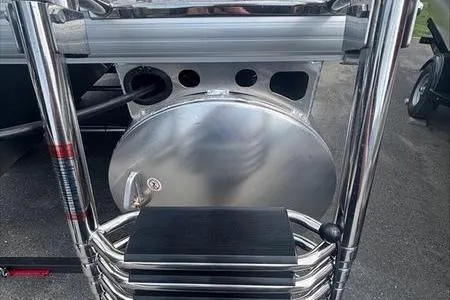 Slide: The Image of Sun Tracker PB 20 DLX 2026 pontoon boat ladder and fuel tank detail. - 12