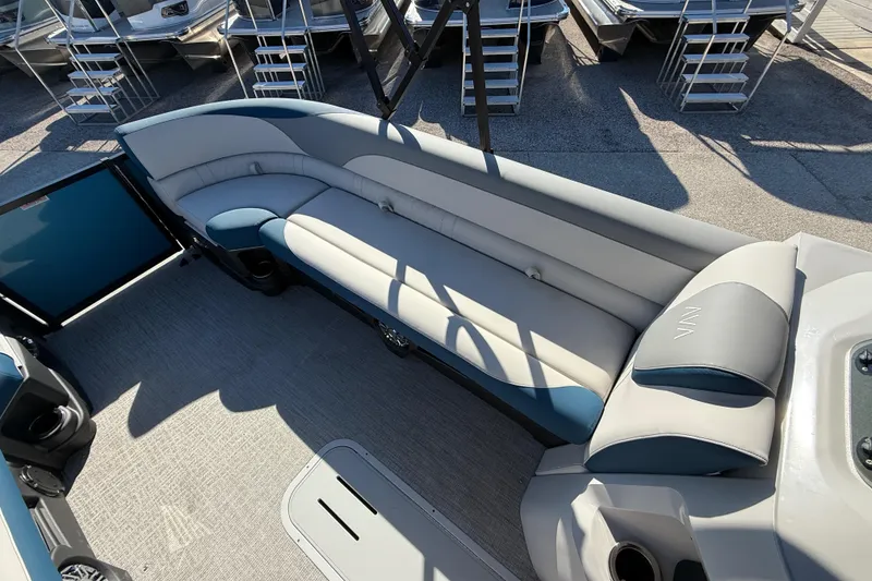 Slide: The Image of 2026 Avalon 2585 LSZ Entertainer boat interior with plush seating and modern design. - 17