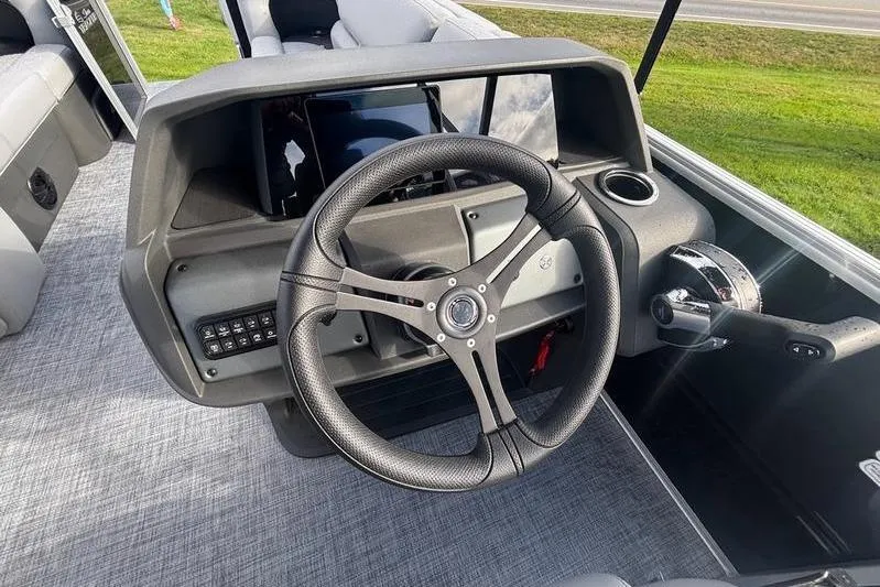 Slide: The Image of Steering console of 2026 Sun Tracker Party Barge 20 DLX pontoon boat. - 11