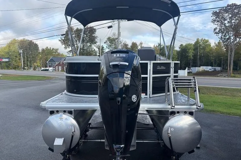 Slide: The Image of 2026 Sun Tracker Party Barge 20 DLX pontoon boat with canopy and outboard motor. - 8