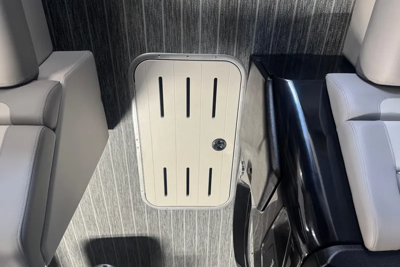 Slide: The Image of Interior of 2026 Premier 230 SunSation RF boat with sleek seating and flooring. - 10