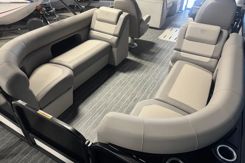 Slide: The Image of 2026 Premier 230 SunSation RF pontoon boat interior with luxurious seating and modern design. - 16