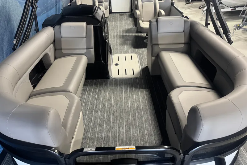 Slide: The Image of 2026 Premier 230 SunSation RF pontoon boat interior with luxurious seating and modern design. - 7