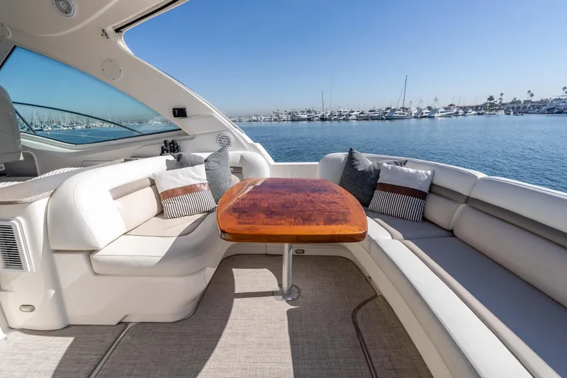 Slide: The Image of Luxurious 2007 Sea Ray 48 Sundancer yacht interior with elegant seating and ocean view. - 15