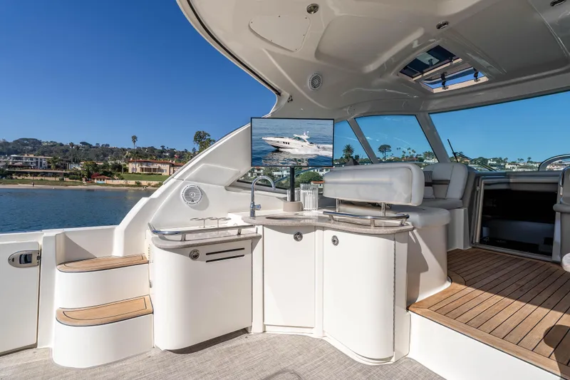 Slide: The Image of Luxurious 2007 Sea Ray 48 Sundancer yacht interior with sleek design and waterfront view. - 16