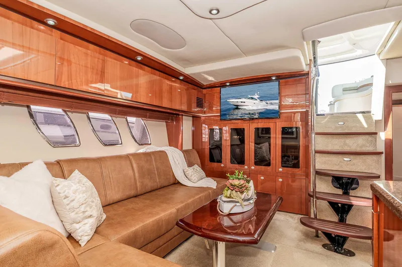 Slide: The Image of Luxurious interior of 2007 Sea Ray 48 Sundancer yacht with plush seating and elegant wood finishes. - 26