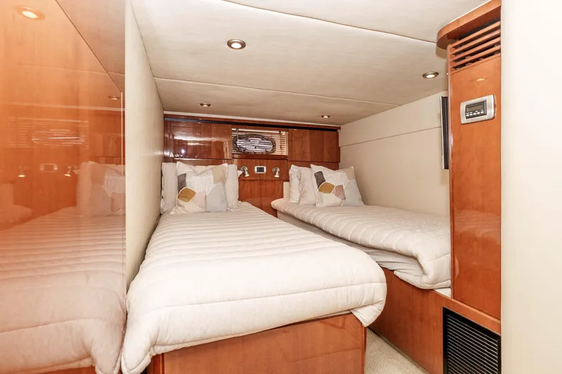 Slide: The Image of Luxurious twin cabin interior of 2007 Sea Ray 48 Sundancer yacht. - 32