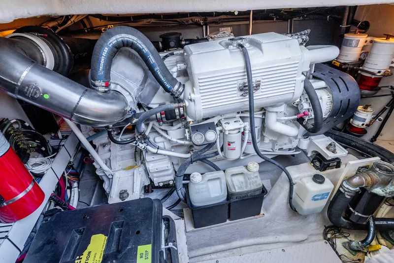 Slide: The Image of Engine room of a 2007 Sea Ray 48 Sundancer, showcasing detailed mechanical components. - 40