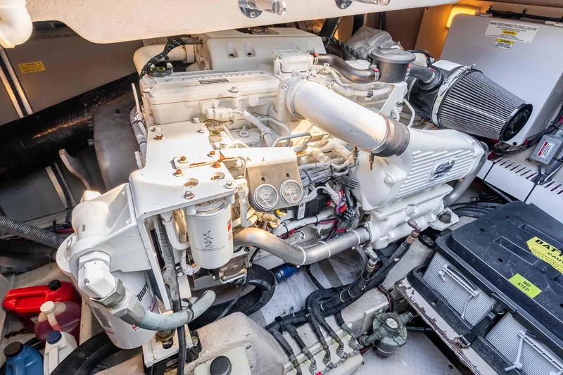 Slide: The Image of Engine room of 2007 Sea Ray 48 Sundancer yacht, showcasing detailed mechanical components. - 41