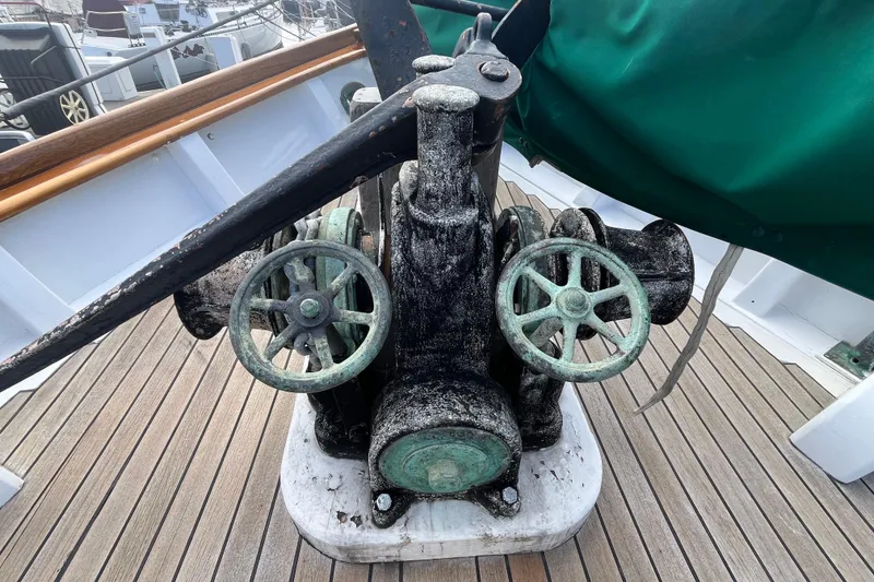 Slide: The Image of Vintage 1947 Murray Peterson Schooner windlass on wooden deck. - 12