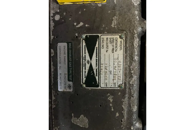 Slide: The Image of Close-up of a 1947 Murray Peterson Schooner engine plate with specifications. - 123