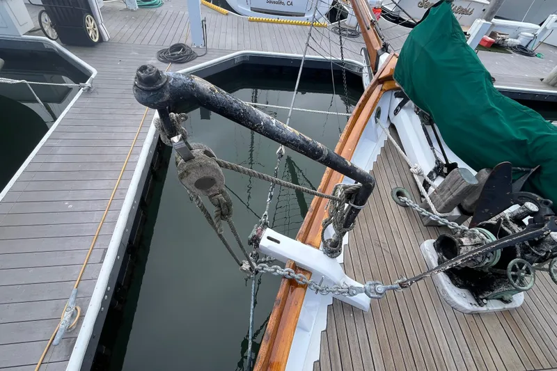 Slide: The Image of 1947 Murray Peterson Schooner docked, showcasing deck and rigging details. - 18