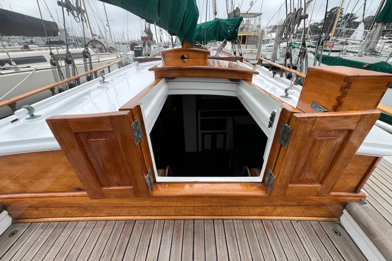 Slide: The Image of Wooden hatch entrance on 1947 Murray Peterson Schooner, docked at marina. - 36