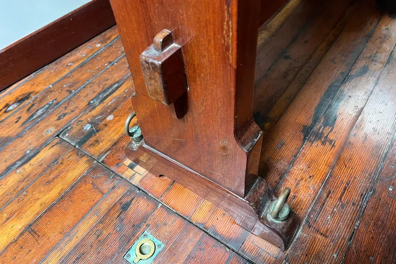 Slide: The Image of Wooden interior detail of a 1947 Murray Peterson Schooner, showcasing craftsmanship and vintage design. - 91