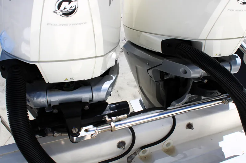 Slide: The Image of Twin outboard engines on a 2021 Boston Whaler 320 Vantage boat. - 15