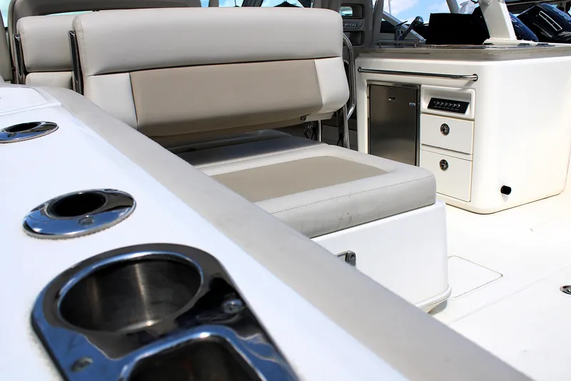 Slide: The Image of Interior of 2021 Boston Whaler 320 Vantage boat with seating and storage. - 21