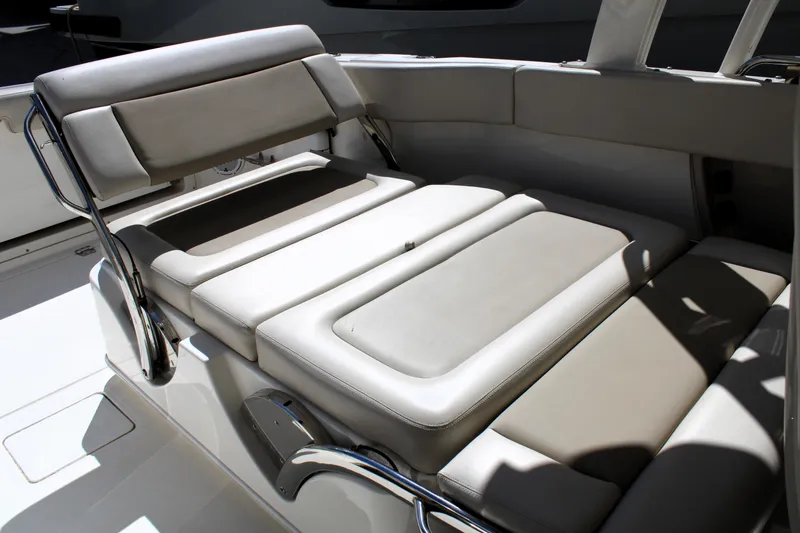 Slide: The Image of 2021 Boston Whaler 320 Vantage boat interior with luxurious seating arrangement. - 37