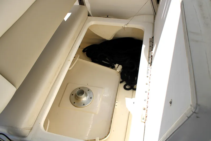 Slide: The Image of Storage compartment in a 2021 Boston Whaler 320 Vantage boat. - 53