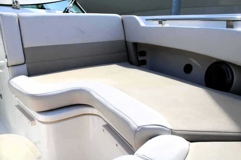 Slide: The Image of 2021 Boston Whaler 320 Vantage boat interior seating area with cushioned upholstery. - 60