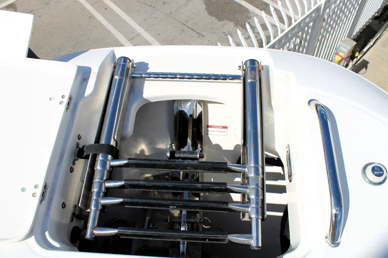 Slide: The Image of 2021 Boston Whaler 320 Vantage swim ladder and handle detail. - 68