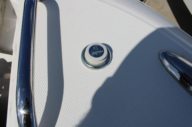 Slide: The Image of Close-up of 2021 Boston Whaler 320 Vantage deck with chrome fittings. - 69