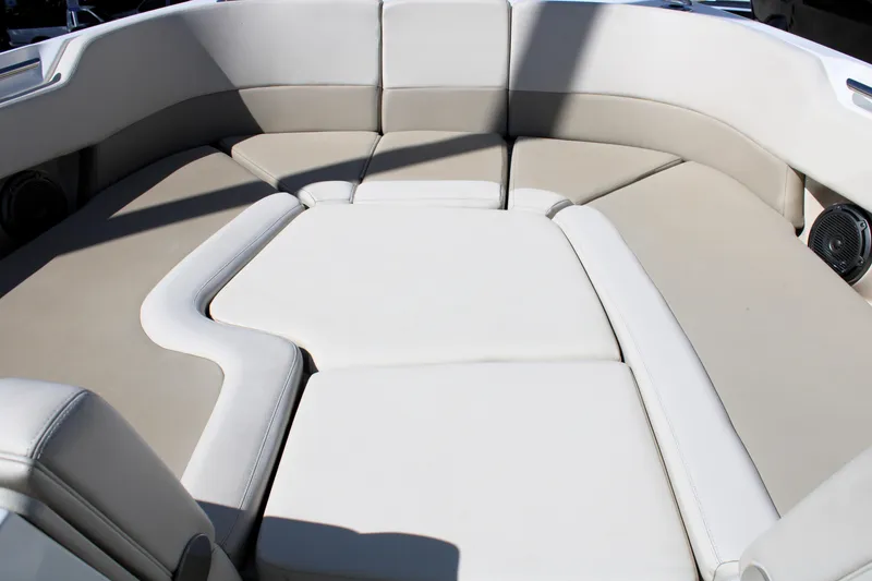 Slide: The Image of 2021 Boston Whaler 320 Vantage boat interior with cushioned seating area. - 72