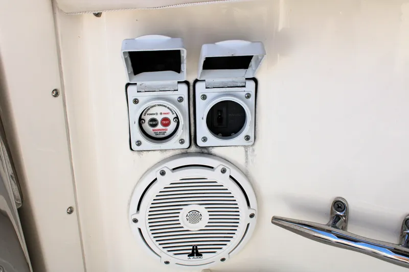 Slide: The Image of 2021 Boston Whaler 320 Vantage boat electrical panel and JL Audio speaker. - 78