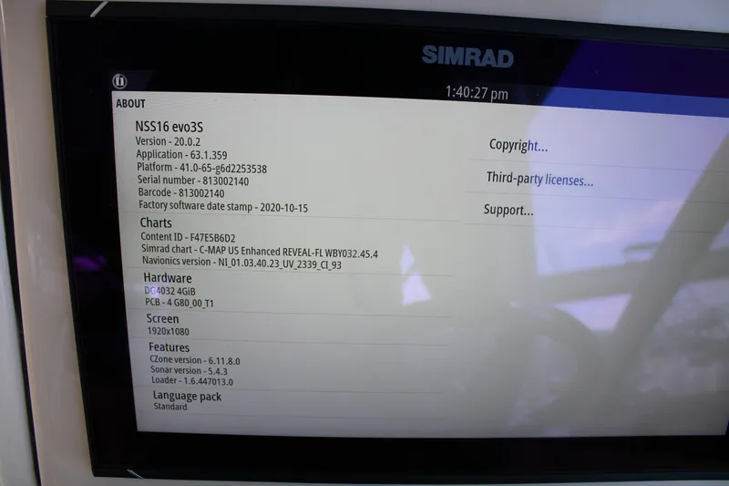 Slide: The Image of Simrad NSS16 evo3S display on 2021 Boston Whaler 320 Vantage, showing software and hardware details. - 80