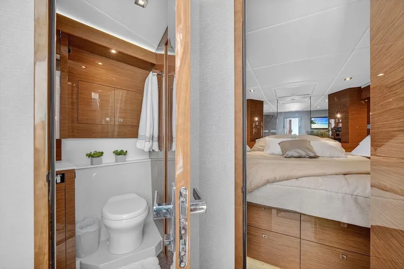Slide: The Image of Luxurious 2020 Cruisers Yachts 50 Cantius interior with modern bathroom and cozy bedroom. - 36