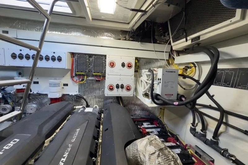 Slide: The Image of Engine room of 2020 Cruisers Yachts 50 Cantius with Volvo Penta engines and electrical systems. - 63