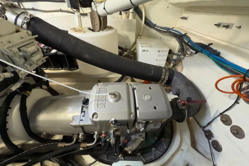 Slide: The Image of Engine room of 2020 Cruisers Yachts 50 Cantius, showcasing mechanical components and wiring. - 64