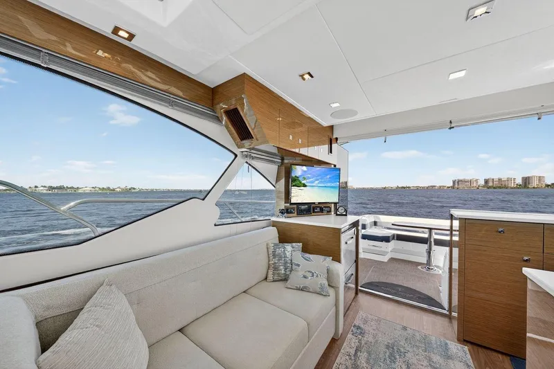 Slide: The Image of Luxurious interior of 2020 Cruisers Yachts 50 Cantius with scenic water view. - 33