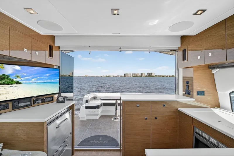 Slide: The Image of Interior of 2020 Cruisers Yachts 50 Cantius with open view to the water. - 35