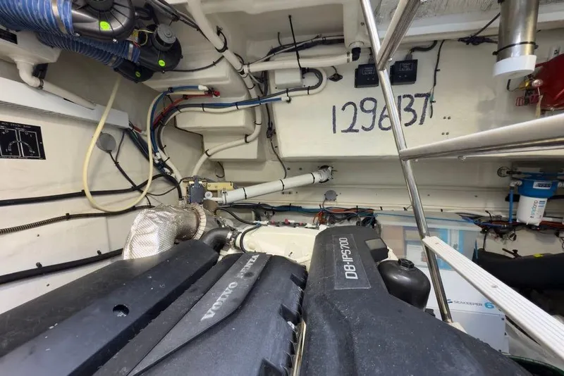 Slide: The Image of Engine room of 2020 Cruisers Yachts 50 Cantius with Volvo Penta engines. - 61