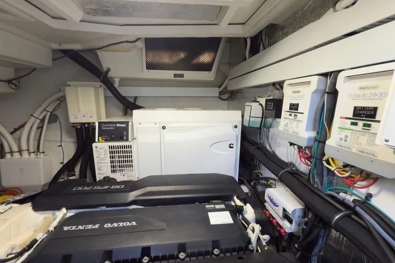 Slide: The Image of Engine room of 2020 Cruisers Yachts 50 Cantius with Cummins generator and Volvo Penta engine. - 70