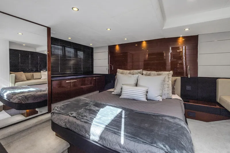 Slide: The Image of Luxurious bedroom interior of 2013 Princess V57 yacht with modern design and plush bedding. - 17