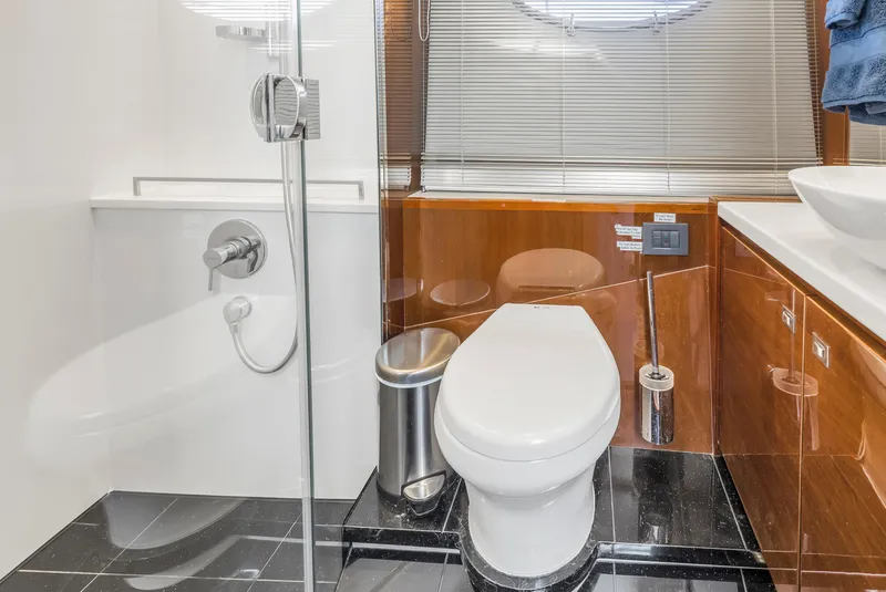 Slide: The Image of Luxurious bathroom in 2013 Princess V57 yacht with modern fixtures and sleek design. - 20