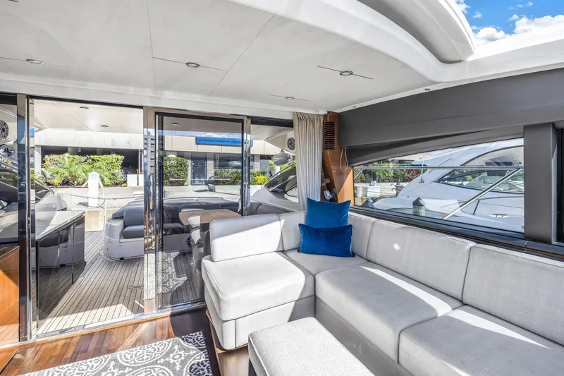 Slide: The Image of Luxurious interior of 2013 Princess V57 yacht with modern seating and large windows. - 24