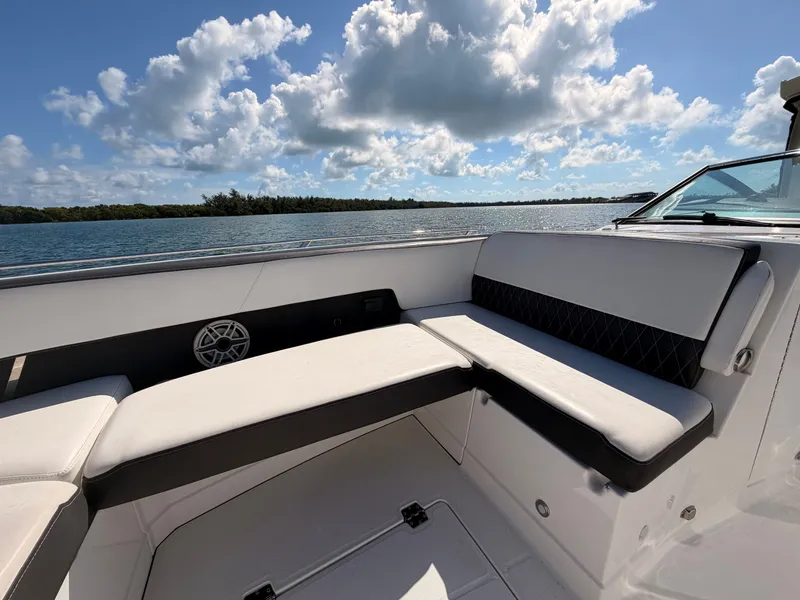 Slide: The Image of Luxurious seating on a 2017 Monterey 378 Super Express boat with scenic water view. - 11